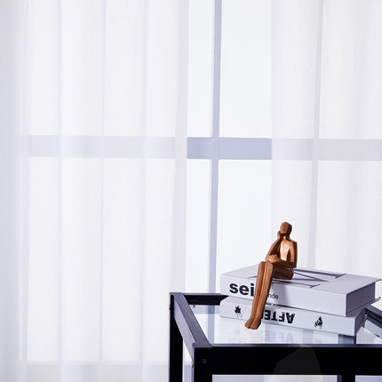 Valkoinen valoverho purjerenkailla