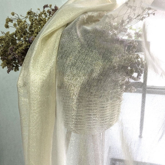 Kimalteleva läpikuultava valoverho