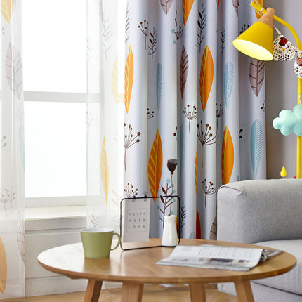 Keltainen lasten pimennysverho lehdillä