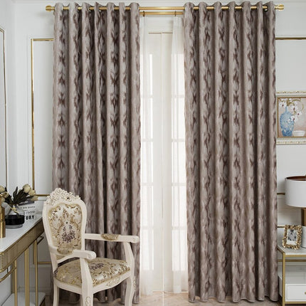 Teksturoitu harmaanruskea pimennysverho makuuhuoneeseen