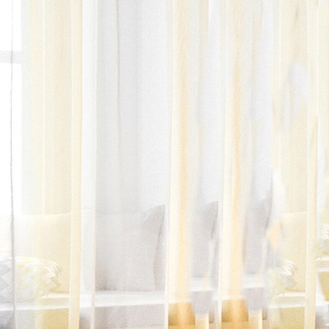 Kelta-harmaa läpikuultava valoverho