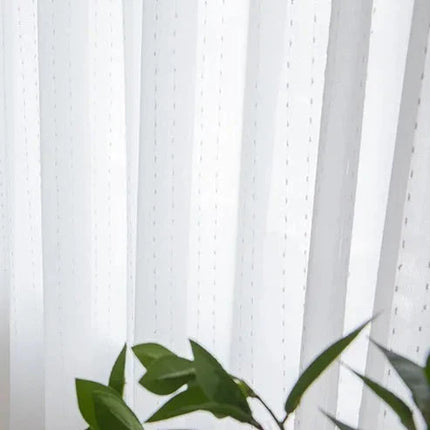 Valoverho kauniilla pilkkukuviolla