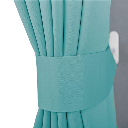 Yksivärinen pimennysverho nauhakiinnityksellä