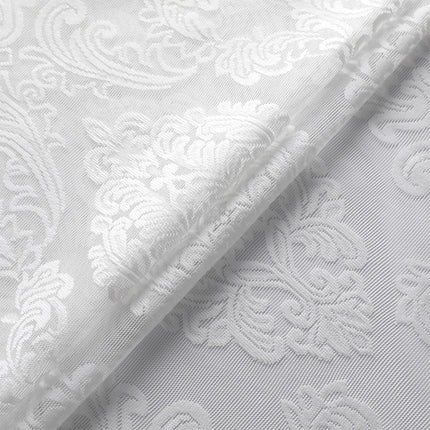 Valkoinen valoverho klassisella damaskikuviolla