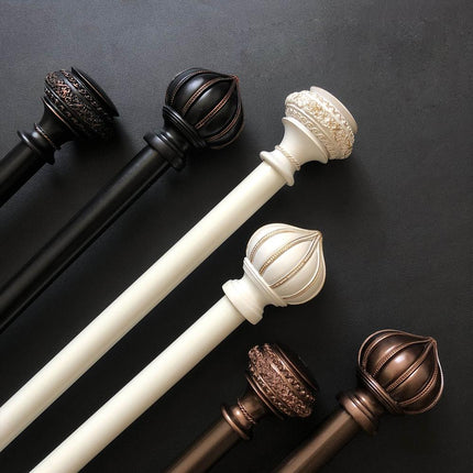 Koristeellinen verhotanko antiikkisella viimeistelyllä