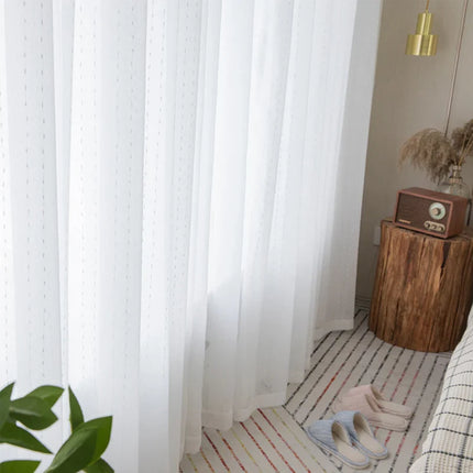 Valoverho kauniilla pilkkukuviolla