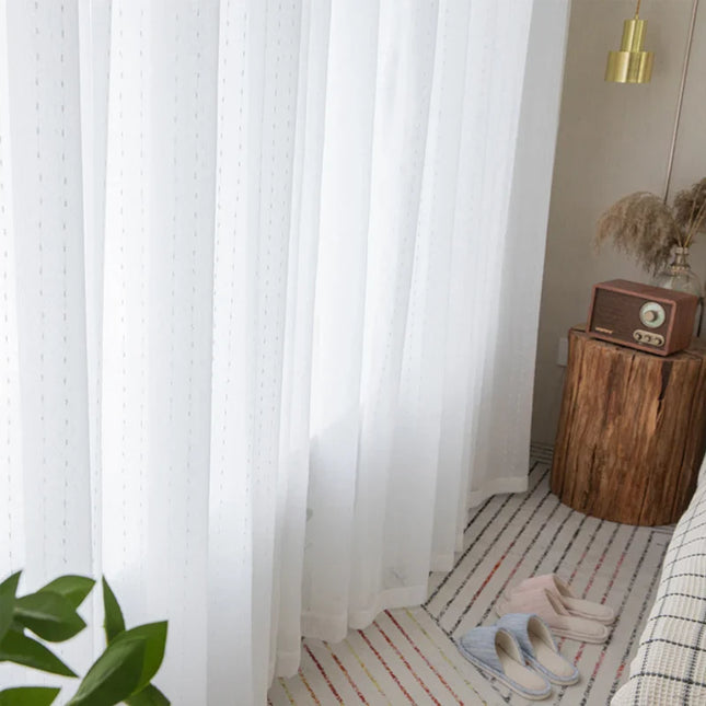 Valoverho kauniilla pilkkukuviolla