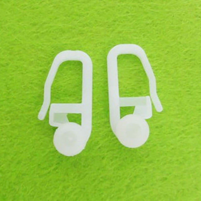 Muoviset verhokoukut rypytysnauhaan