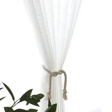 Valoverho kauniilla pilkkukuviolla