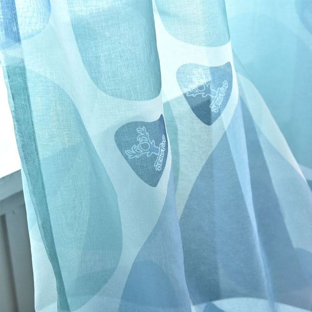 Lastenhuoneen valoverho porokuviolla