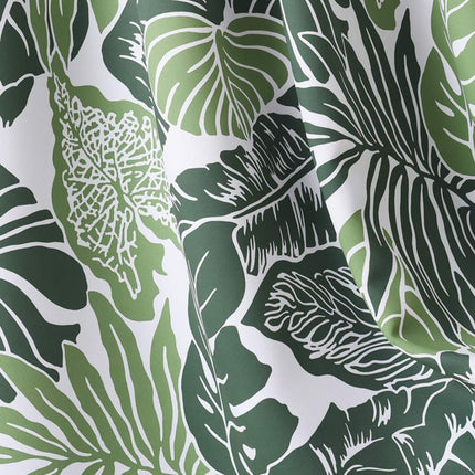 Lyhyet verhot vihreällä lehtikuviolla