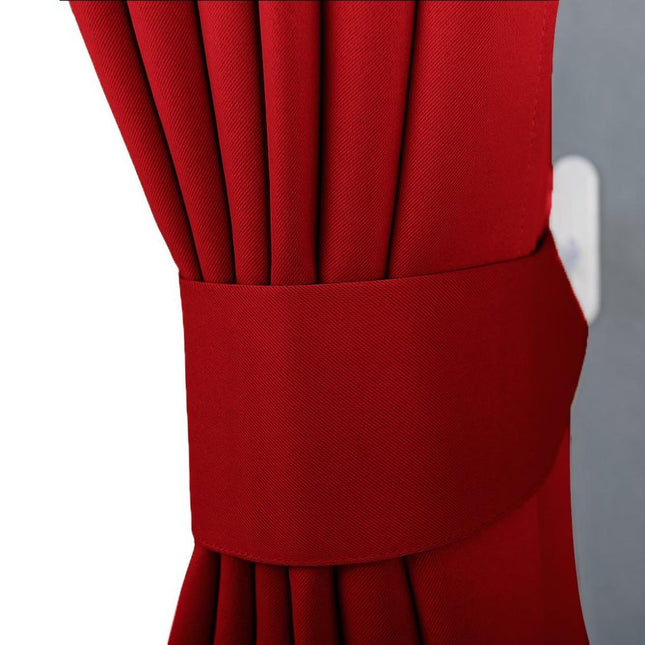 Yksivärinen pimennysverho nauhakiinnityksellä