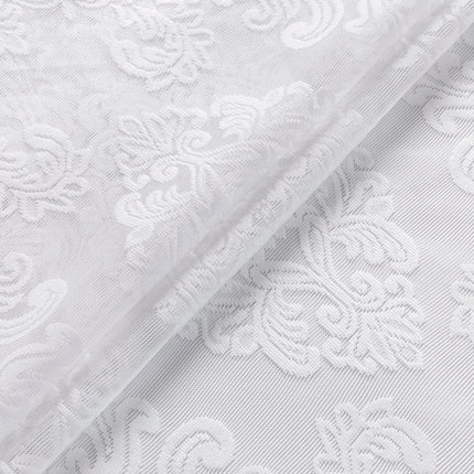 Elegantti valkoinen valoverho damastikuviolla