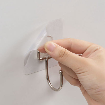 Itsekiinnittyvä seinäkoukku ilman porausta