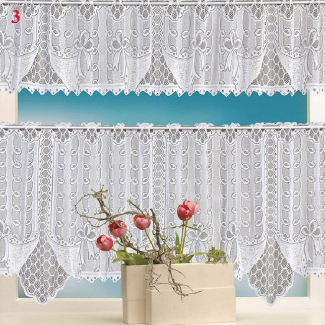 Valkoinen pitsinen keittiöverhosetti