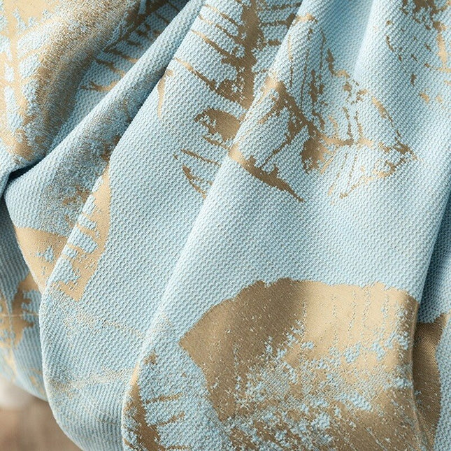 Verho tyylikkäällä kultaisella lehtikuviolla