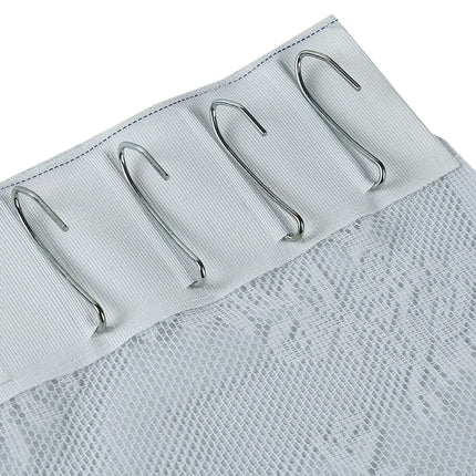 Valkoinen kukkakuvioinen pitsiverho