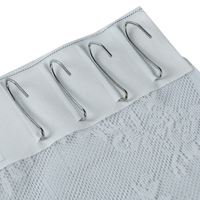 Valkoinen kukkakuvioinen pitsiverho