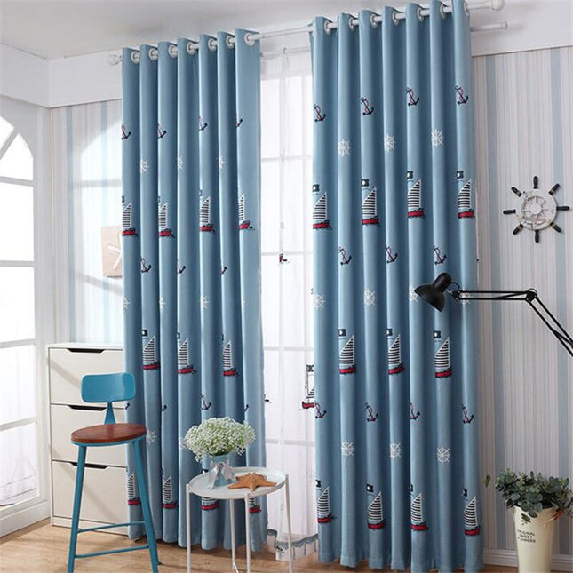 Kirjailtu valoverho purjevene-aiheella