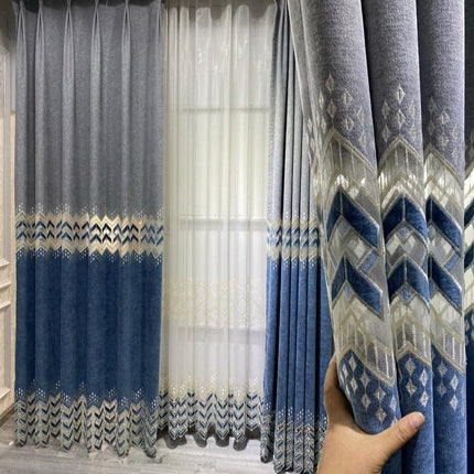 Valoverho kirjaillulla siksak-kuviolla