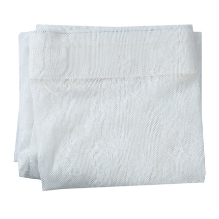 Valkoinen kukkakuvioinen pitsiverho