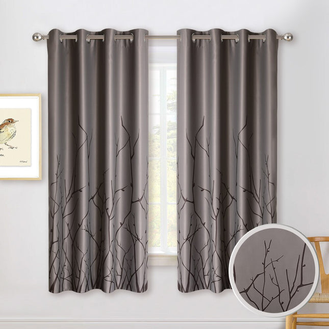 Luontoaiheinen verho oksakuviolla olohuoneeseen