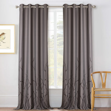 Luontoaiheinen verho oksakuviolla olohuoneeseen