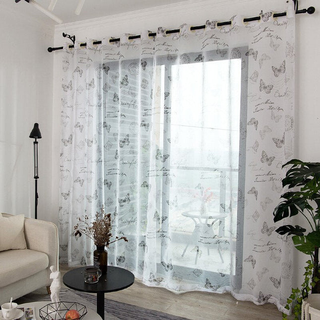 Valkoverho kauniilla perhoskuviolla