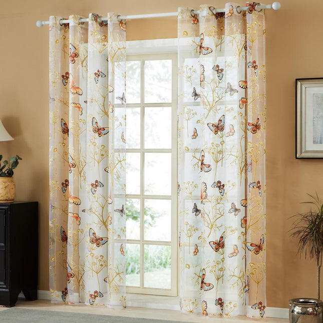 Läpikuultava verho värikkäillä perhosilla