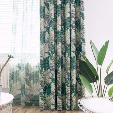 Pimennysverho trooppisella vihreällä lehtikuviolla
