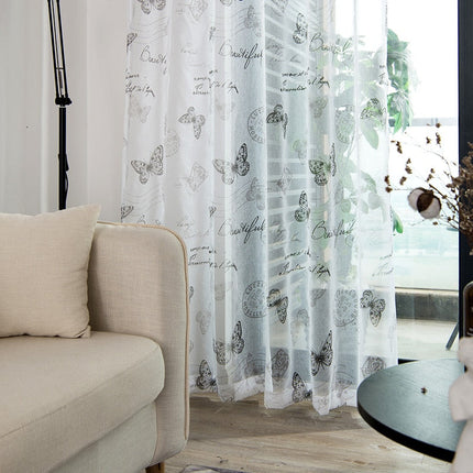 Valkoverho kauniilla perhoskuviolla