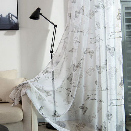 Valkoverho kauniilla perhoskuviolla