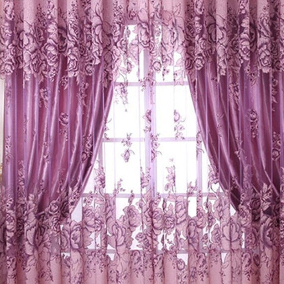 Vaaleanpunainen valoverho näyttävällä kukkakuviolla