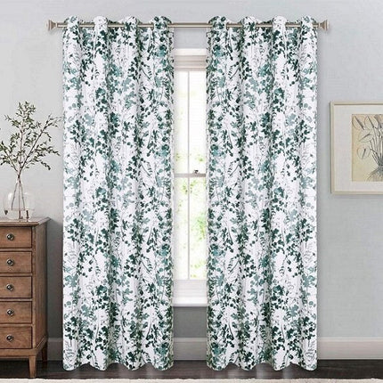 Valkoinen verho vihreällä kukkakuviolla