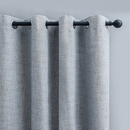 Harmaa pellavavaikutteinen verho purjerenkailla