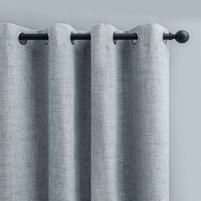 Harmaa pellavavaikutteinen verho purjerenkailla