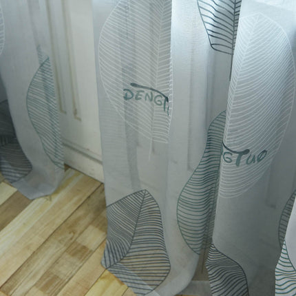 Valoverho tyylitellyllä lehtikuviolla