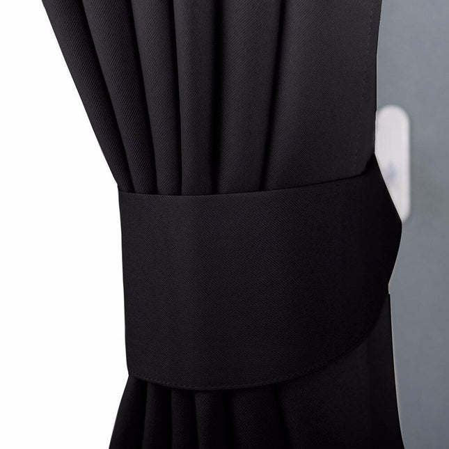 Yksivärinen pimennysverho nauhakiinnityksellä