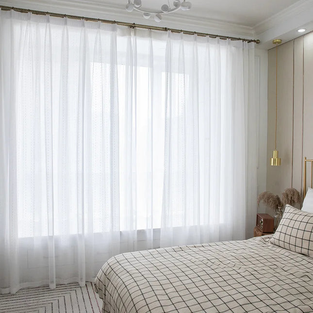 Valoverho kauniilla pilkkukuviolla