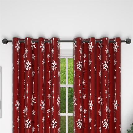 Punainen jouluverho lumihiutalekuviolla