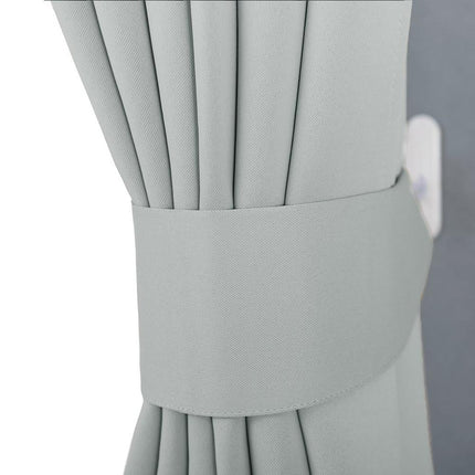 Yksivärinen pimennysverho nauhakiinnityksellä