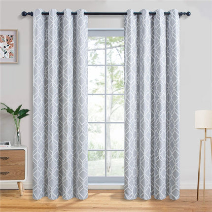 Vaaleanharmaa pimennysverho geometrisella kuviolla