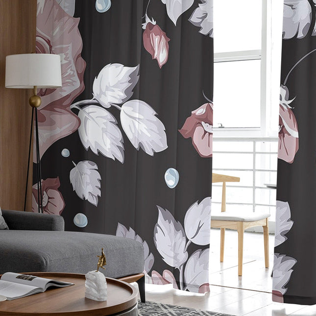 Musta läpikuultava verho ruusukuviolla