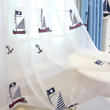 Kirjailtu valoverho purjevene-aiheella