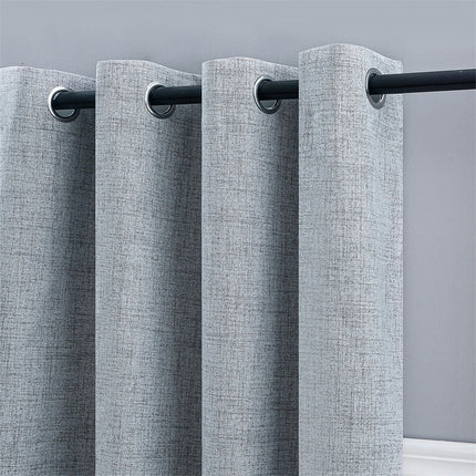 Harmaa pellavavaikutteinen verho purjerenkailla