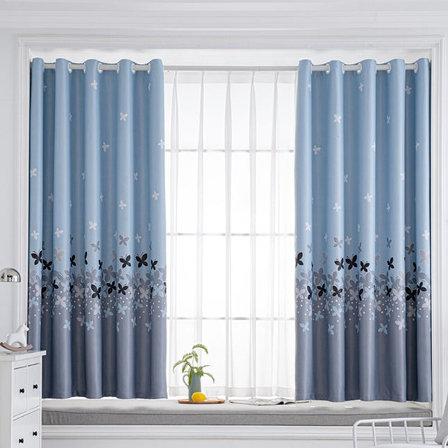 Verho perhoskuviolla tytön huoneeseen