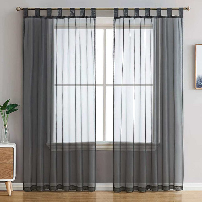 Harmaa läpikuultava verho tampeilla