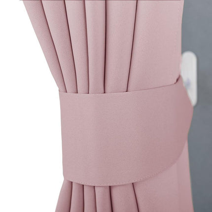 Yksivärinen pimennysverho nauhakiinnityksellä