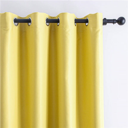 Kirkkaankeltainen pimennysverho lastenhuoneeseen