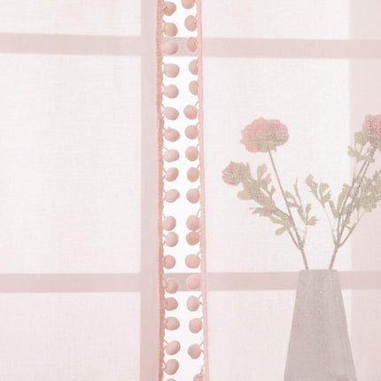 Valkoinen valoverho tupsureunuksella